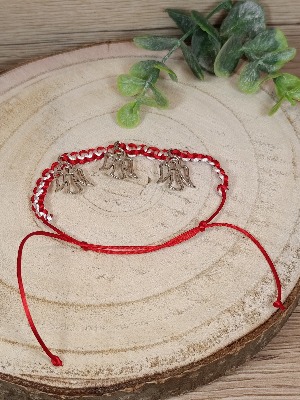 Pletený náramek s andílky